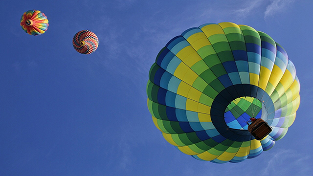 three hot air balloons