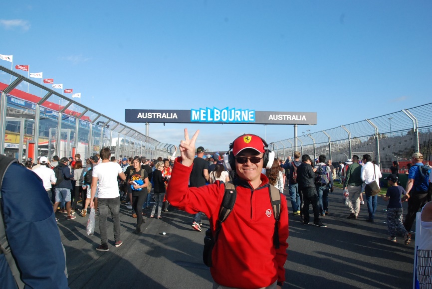 A person in a red jacket and hat holding up a peace sign
AI-generated content may be incorrect.